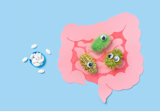 gut-health-concept-with-medicine-and-cute-germs-2026-03-17-07-21-03-utc (1)
